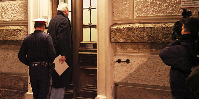 Former Former Croatian Prime Minister Ivo Sanader, second left, walks into a courthouse in Salzburg, northern Austria, Friday, Dec. 10, 2010. Sanader was arrested Friday on an international warrant a day after he left his home country amid a corruption probe. Sanader was taken into custody on the expressway connecting the provinces of Salzburg and Carinthia and then brought to the detention facilities of the Salzburg provincial court, said Alexander Marakovits, a spokesman for the Austrian Federal Office of Criminal Investigations.(AP Photo/Doris Wild)
