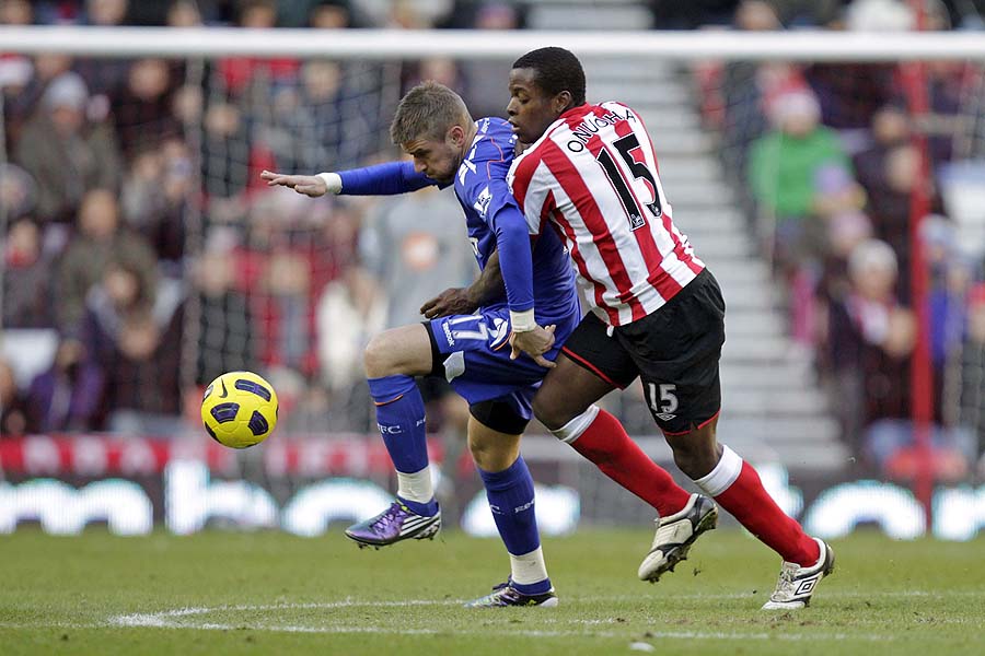 Sunderland's English defender Nedum Onuoha (R) vies with Bolton Wanderers' Croatian striker Ivan Klasnic (L) during the English Premier League football match between Sunderland and Bolton Wanderers at the Stadium of Light, Sunderland, north-east England, on December 18, 2010. AFP PHOTO/GRAHAM STUARTFOR EDITORIAL USE ONLY Additional licence required for any commercial/promotional use or use on TV or internet (except identical online version of newspaper) of Premier League/Football League photos. Tel DataCo +44 207 2981656. Do not alter/modify photo.