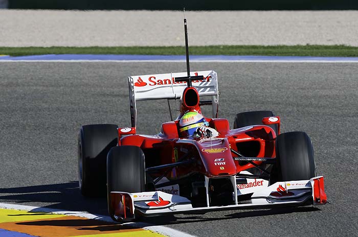 Ferrari Brazilian driver Felipe Massa takes a curve during a training session at Ricardo Tormo's racetrake in Cheste near Valencia, on February 01, 2010.AFP PHOTO/JOSE JORDAN