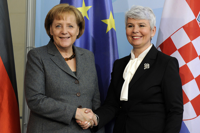 German Chancellor Angela Merkel (L) shakes hands with Croatian Prime Minister Jadranka Kosor at the Chancellory in Berlin on February 3, 2010 after bilateral talks.     AFP PHOTO   DDP / AXEL SCHMIDT    GERMANY OUT