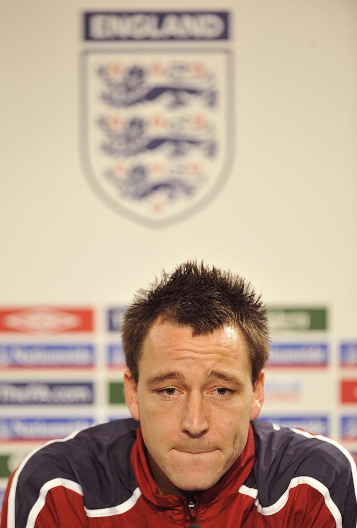 (FILES) A file picture taken on November 19, 2008, shows former England captain John Terry at a press conference in Berlin. John Terry was stripped of the England captaincy following reports of an extra-marital affair with the ex-girlfriend of international team-mate Wayne Bridge, the Football Association (FA) confirmed on Friday February 5, 2010. AFP PHOTO/JOHN MACDOUGALL/FILES
