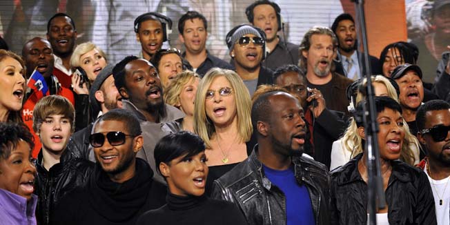 Actors and singers perform at a recording session of the 1985 song 