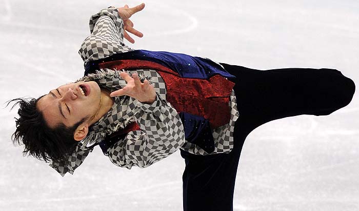 Bronze medalist Japan's Daisuke Takahashi performs in the Men's figure skating free program at the Pacific Coliseum in Vancouver on February 18, 2010. AFP PHOTO / Saeed KHAN