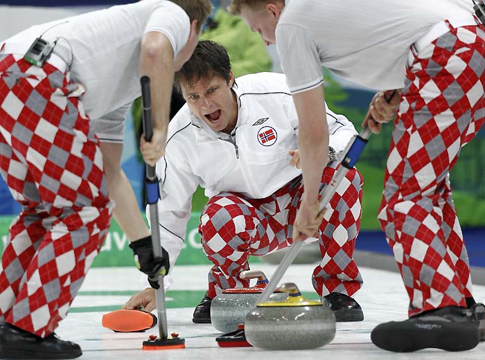 Norway's skip Thomas Ulsrud shouts instructions during their men's round robin curling game against France at the Vancouver 2010 Winter Olympics February 22, 2010.     REUTERS/Andy Clark (CANADA)