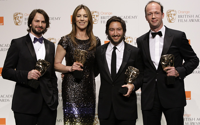 From left to right, US screeenwriter Mark Boal, US director Kathryn Bigelow, producer Greg Shapiro and French Nicolas Chartier, pose for the photographers with their awards for Best Film with their latest film ' The Hurt Locker', in the media room at the British Academy Film Awards 2010 at The Royal Opera House in London, Sunday, Feb. 21, 2010. (AP Photo/Joel Ryan)