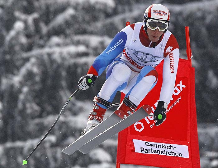 Carlo Janka of Switzerland is airborne during a training run for the men's Alpine Skiing World Cup Downhill in Garmisch-Partenkirchen March 9, 2010. The Bavarian skiing resort of Garmisch-Partenkirchen, some 80km (50 miles) south of Munich, hosts the season's Alpine Skiing World Cup Finals from March 10 to 14.   REUTERS/Wolfgang Rattay   (GERMANY - Tags: SPORT SKIING)