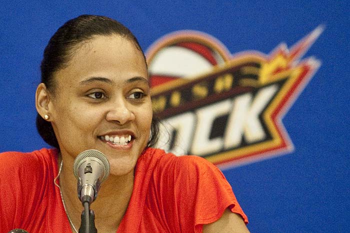 Former sprinter Marion Jones smiles as she addresses the media during a news conference announcing her signing with  WNBA basketball  Tulsa Shock on Wednesday, March 10, 2010, in Tulsa, Okla. Jones was a star at the 2000 Sydney Olympics but admitted two years ago that she had taken the 