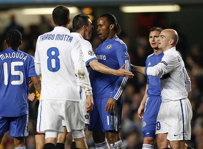Chelsea's Ivory Coast footballer Didier Drogba (3rd R) confronts Inter Milan's Brazilian player Lucio (3rd L) during their UEFA Champions League second round, second leg football match at Stamford Bridge in London on March 16, 2010. AFP PHOTO/IAN KINGTON