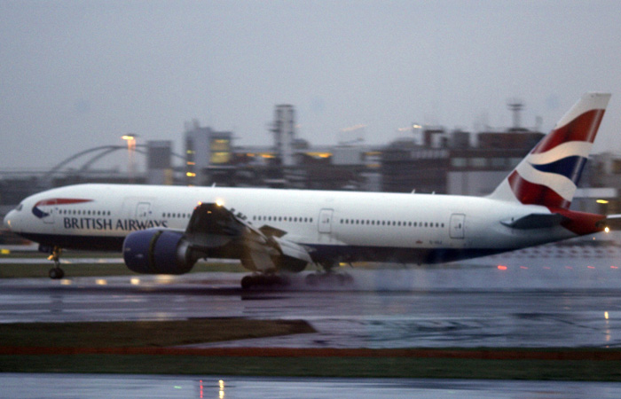A British Airways plane is seen from Terminal 4 moving along the tarmac at Heathrow Airport in London, early Saturday, March 20, 2010. A three-day strike by British Airways cabin crew affecting thousands of travelers began Saturday after last-ditch talks between the airline's management and union leaders collapsed. (AP Photo/Matt Dunham)