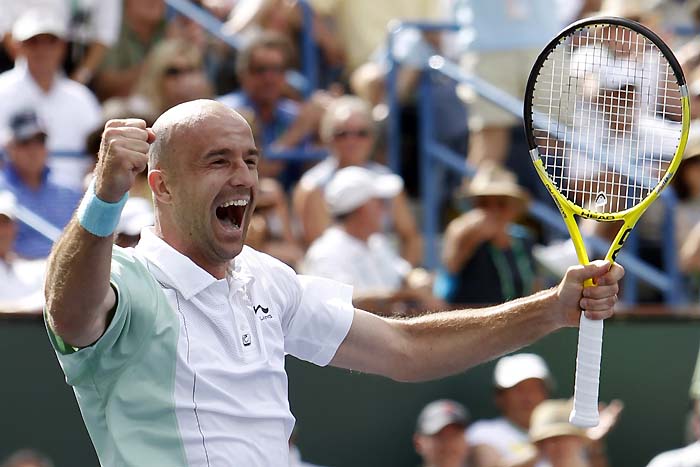 Ivan Ljubicic of Croatia celebrates his semi-final victory over Rafael Nadal of Spain at the Indian Wells ATP tennis tournament in Indian Wells, California March 20, 2010.   REUTERS/Kevin Lamarque  (UNITED STATES - Tags: SPORT TENNIS)
