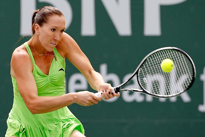 INDIAN WELLS, CA - MARCH 21: Jelena Jankovic of Serbia returns a shot to Caroline Wozniacki of Denmark the final of the BNP Paribas Open on March 21, 2010 at the Indian Wells Tennis Garden in Indian Wells, California.   Matthew Stockman/Getty Images/AFP== FOR NEWSPAPERS, INTERNET, TELCOS & TELEVISION USE ONLY ==