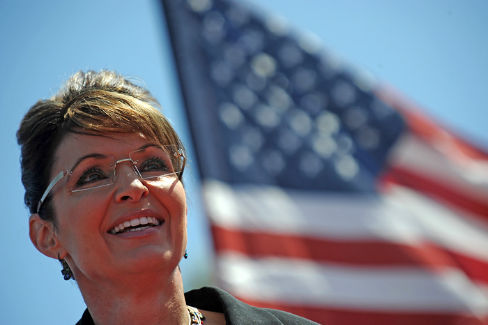 Former US vice-presidential candidate Sarah Palin speaks at a Tea Party rally in Searchlight, Nevada on March 27, 2010.  Thousands of Tea Party activists attended the rally which kicks off their latest cross-country protest against big government and health care reform.   AFP PHOTO / Robyn BECK