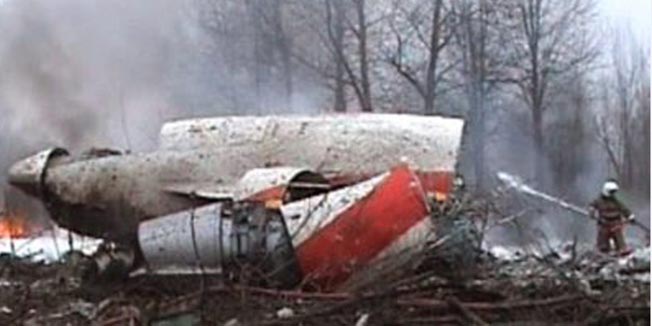 Image from video footage shows a firefighter working to extinguish the flames from the wreckage of a Polish government Tupolev Tu-154 aircraft that crashed near Smolensk airport April 10, 2010. There were no survivors in the crash of the plane carrying Polish President Lech Kaczynski in Russia on April 10, Polish state news agency PAP reported, quoting local officials in Smolensk. The Polish central bank governor Slawomir Skrzypek was also on board the plane, the bank's press office told Reuters. REUTERS/Handout (RUSSIA - Tags: POLITICS DISASTER TRANSPORT IMAGES OF THE DAY) FOR EDITORIAL USE ONLY. NOT FOR SALE FOR MARKETING OR ADVERTISING CAMPAIGNS
