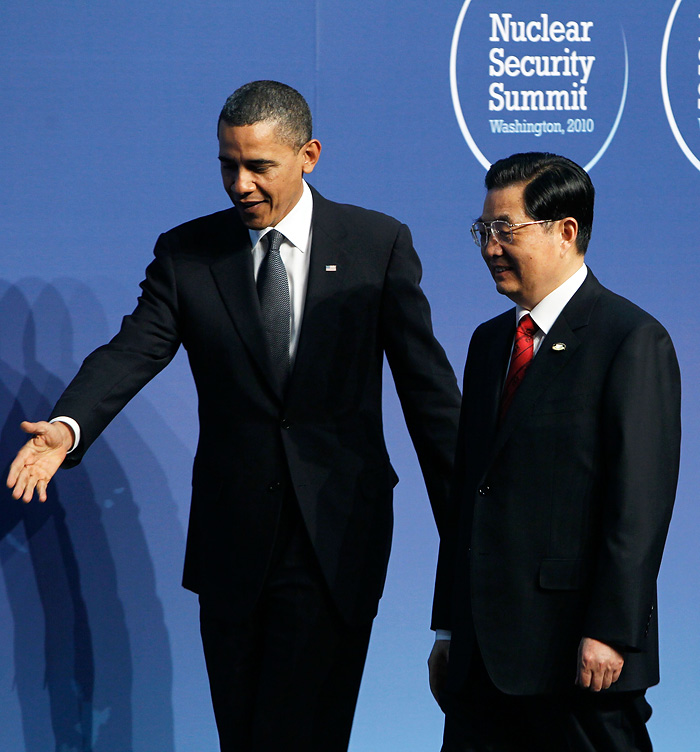 WASHINGTON - APRIL 12: U.S. President Barack Obama (L) shows the way to President of China Hu Jintao (R) at the Nuclear Security Summit April 12, 2010 in Washington, DC. President Obama hosted leaders of the 47 nations for the two-day Nuclear Security Summit to discuss solutions to cut down nuclear weapons around the world.   Alex Wong/Getty Images/AFP== FOR NEWSPAPERS, INTERNET, TELCOS & TELEVISION USE ONLY ==