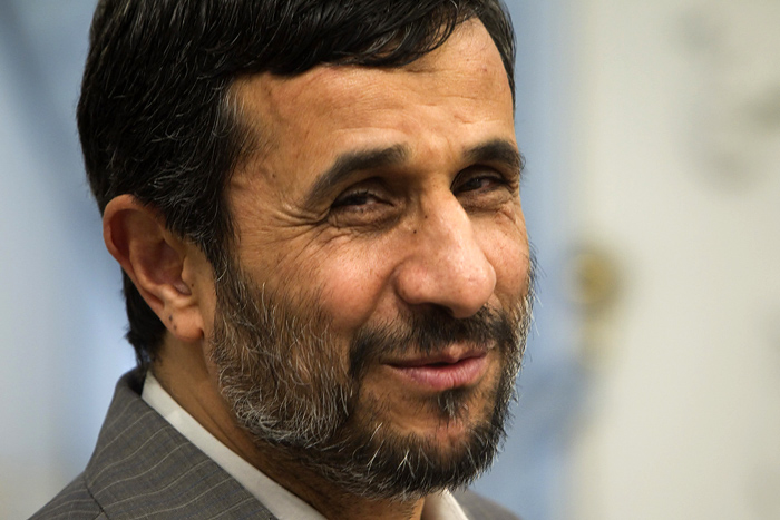 EDITORS' NOTE: Reuters and other foreign media are subject to Iranian restrictions on leaving the office to report, film or take pictures in Tehran.Iran's President Mahmoud Ahmadinejad smiles while waiting for Brazil's Minister of Development, Industry and Foreign Trade Miguel Jorge before an official meeting in Tehran April 13, 2010. REUTERS/Morteza Nikoubazl (IRAN - Tags: HEADSHOT POLITICS PROFILE)