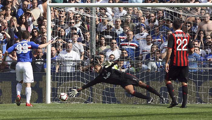 Sampdoria forward Antonio Cassano, left, scores past AC Milan goalie Nelson Dida of Brazil from a penalty kick during a Serie A soccer match between Sampdoria and AC Milan at the Genoa Luigi Ferraris stadium, Italy, Sunday, April 18, 2010. (AP Photo/Carlo Baroncini)