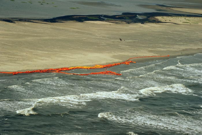 Oil boom barriers that are expected to stop the spread of oil from the BP Deepwater Horizon platform disaster, lies washed up on the beach after heavy swells and winds hit the coast of Louisiana on April 30, 2010.  A giant oil slick threatened economic and environmental devastation as it closed in on Louisiana's vulnerable coast, prompting the US government to declare a national disaster. Louisiana governor Bobby Jindal declared a state of emergency and called for urgent help to prevent fragile wetlands and vital fishing communities along the coast from pollution on a massive scale. The wind started to strengthen and blow the 600-square-mile (1,550-square-kilometer) slick directly onto the coast, where a rich variety of wildlife were at risk in the maze of marshes that amounts to 40 percent of the US wetlands.                AFP PHOTO/Mark RALSTON