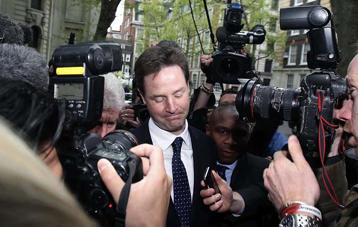 Britain's Liberal Democrat leader Nick Clegg returns to the Local Government Association building after attending a Victory in Europe (VE) day ceremony in London May 8, 2010. Clegg sought backing from senior party members on Saturday for a possible deal with the Conservatives after an election in which no party won an outright majority. REUTERS/Cathal McNaughton (BRITAIN - Tags: POLITICS ELECTIONS)