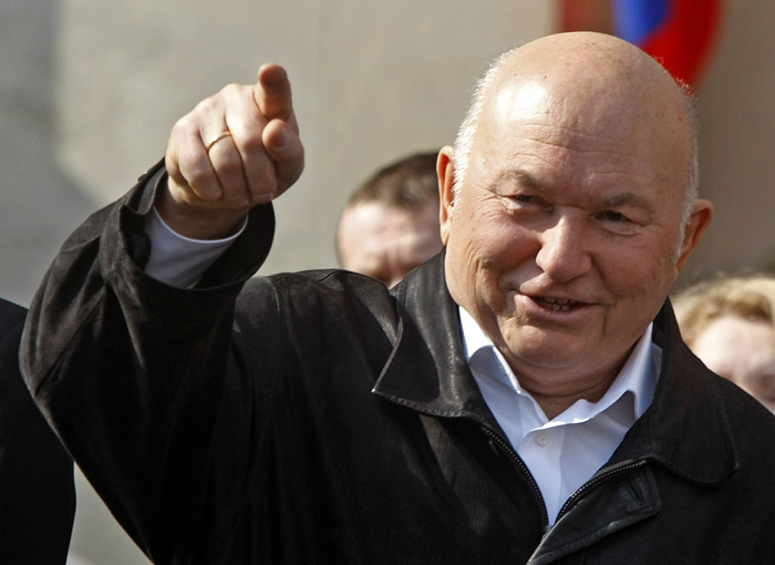 Moscow Mayor Yuri Luzhkov gestures as United Russia party and government-linked trade unions take to the streets to mark May Day in Moscow,  Russia, Saturday, May 1, 2010. (AP Photo/Mikhail Metzel)
