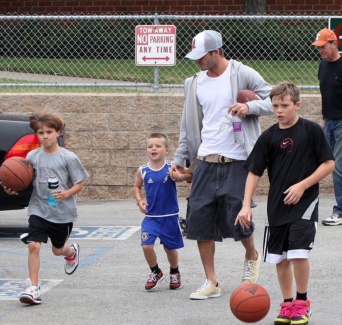 David Beckham took the boys to the park, with a football and basket ball, but no soccer ball.  Also, son Cruz is wearing a Chelsea patch on his shorts, but David played for Manchester.  May 16, 2010 X17online.com EXCLUSIVE