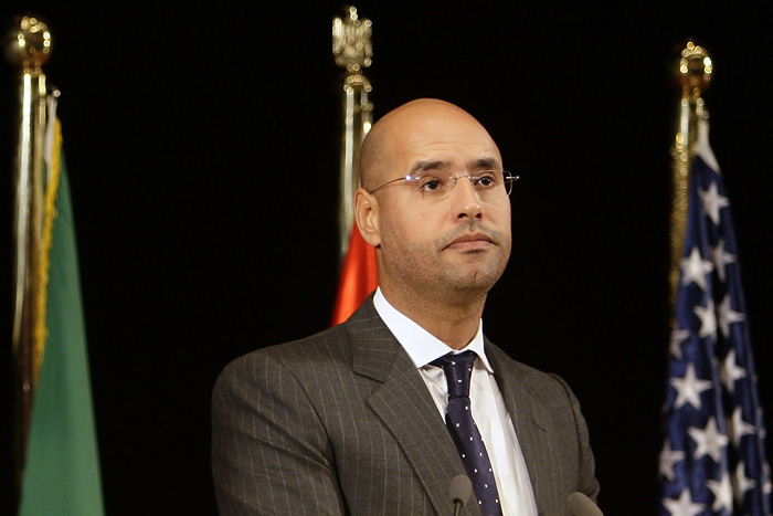 Saif Al-Islam Gaddafi, son of Libyan leader Muammar Gaddafi and chairman of the Al Qaddafi International Foundation for Charity and Development, addresses students and staff at the American University in Cairo May 5, 2010. Gaddafi on Wednesday said a constitution is vital to Libya's prosperity and the country should speed up reforms of its opaque administrative system. REUTERS/Amr Abdallah Dalsh (EGYPT - Tags: POLITICS)