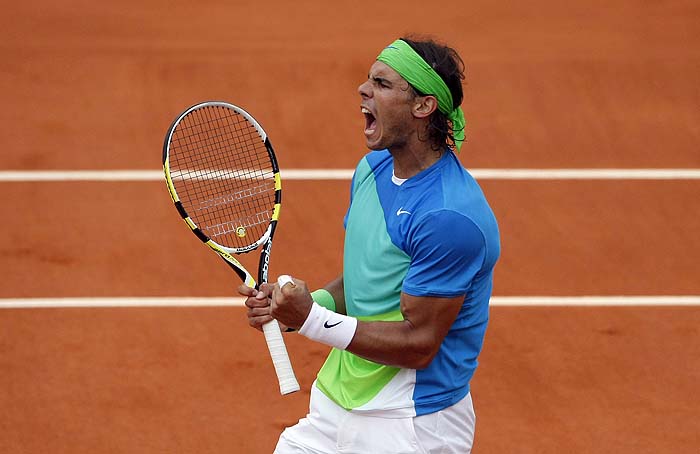 Spain's Rafael Nadal reacts as he plays  Sweden's Robin Soderling during the men's final match of  the French Open tennis tournament at the Roland Garros stadium in Paris, Sunday, June 6, 2010. (AP Photo/Michel Spingler)
