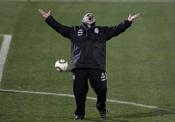 Argentina's soccer team coach Diego Maradona celebrates after scoring a goal during practice in Pretoria, South Africa, Friday, June 18, 2010. Argentina plays in the Group B of the World Cup. (AP Photo/Ricardo Mazalan)