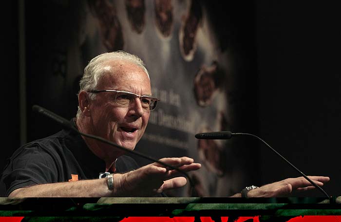 German soccer legend Franz Beckenbauer addresses a news conference at the Velmore hotel in Pretoria June 9, 2010. The 2010 Soccer World Cup kicks off on June 11. REUTERS/Ina Fassbender (SOUTH AFRICA - Tags: SPORT SOCCER WORLD CUP)