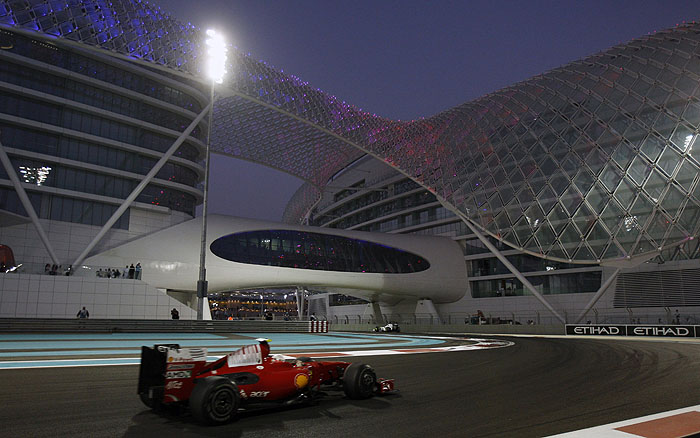Ferrari Formula One driver Kimi Raikkonen of Finland steers his car during the Abu Dhabi Formula One Grand Prix at the Yas Marina racetrack , in Abu Dhabi, United Arab Emirates, Sunday, Nov.1, 2009. (AP Photo/Luca Bruno)