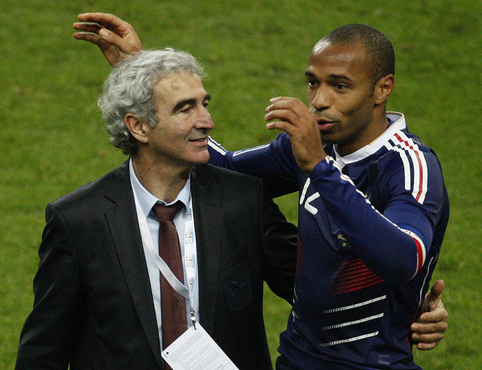 French coach Raymond Domenech, left, and French captain Thierry Henry, react after the World Cup qualifying playoff second leg soccer match against the Republic of Ireland, at Stade de France stadium, in Saint Denis, outskirts of Paris, Wednesday, Nov. 18, 2009. (AP Photo/Michel Euler)