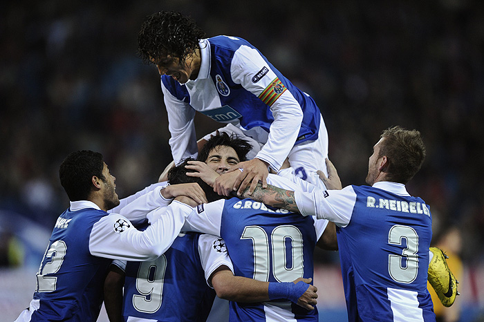 FC Porto celebrate after their team's second goal against Atletico Madrid during their Champions League soccer match at the Vicente Calderon stadium in Madrid, Spain, Tuesday, Dec. 8, 2009. (AP Photo/Daniel Ochoa de Olza)