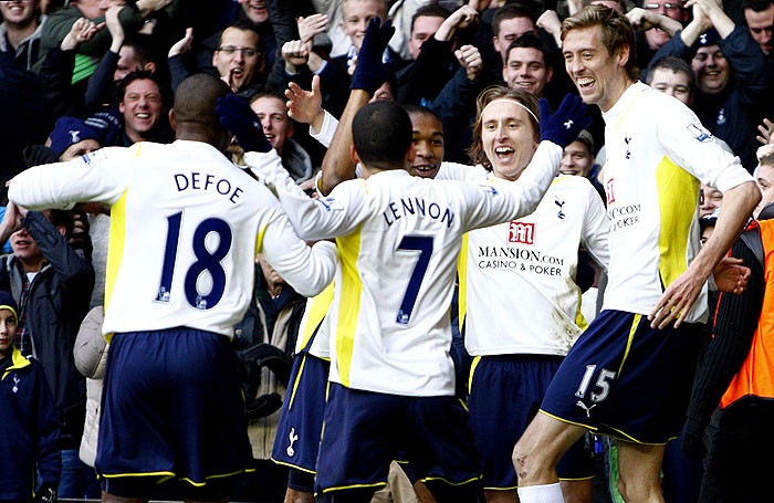 Tottenham Hotspur's Luka Modric, second from right, celebrates scoring the opening goal of the game against West Ham with his teammates during the English Premier League soccer match at White Hart Lane, London, Monday Dec. 28, 2009. Tottenham won the match 2-0. (AP Photo/PA, Sean Dempsey) ** UNITED KINGDOM OUT NO SALES NO ARCHIVE - NO INTERNET/MOBILE USAGE WITHOUT FOOTBALL ASSOCIATION PREMIER LEAGUE (FAPL) LICENCE. CALL +44 (0) 20 7864 9121 or EMAIL info@football-dataco.com FOR DETAILS **