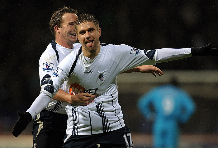 Bolton Wanderers' Croatian forward Ivan Klasnic (R) celebrates with Bolton Wanderers' English forward Kevin Davies after scoring against Hull City during their English Premier League football match at The Reebok Stadium in Bolton, north-west England, on December 29, 2009. AFP PHOTO/PAUL ELLIS -  FOR EDITORIAL USE ONLY Additional licence required for any commercial/promotional use or use on TV or internet (except identical online version of newspaper) of Premier League/Football League photos. Tel DataCo +44 207 2981656. Do not alter/modify photo.