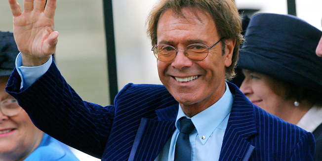 (FILES) In a file picture taken on August 31, 2007 British pop singer Sir Cliff Richard arrives for the memorial service marking the 10th anniversary of princess Diana in London. Veteran British singer Cliff Richard on August 14, 2014 strongly denied allegations of sexual impropriety after police investigating an historic claim of abuse against a boy searched one of his properties.   AFP PHOTO / CARL DE SOUZA