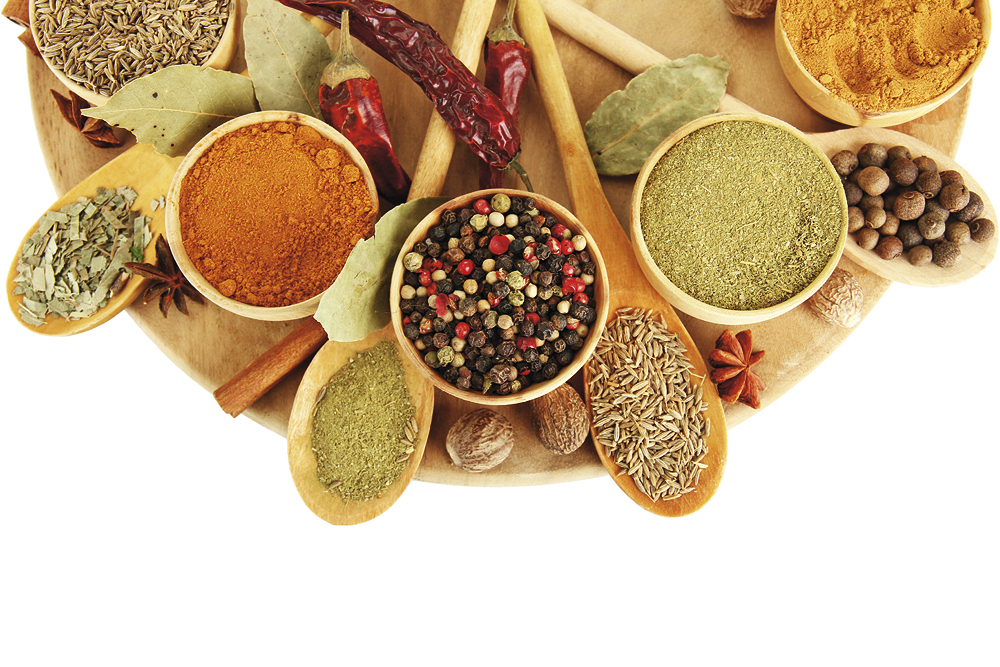 wooden-bowls-and-spoons-with-spices-isolated-on-white.bin