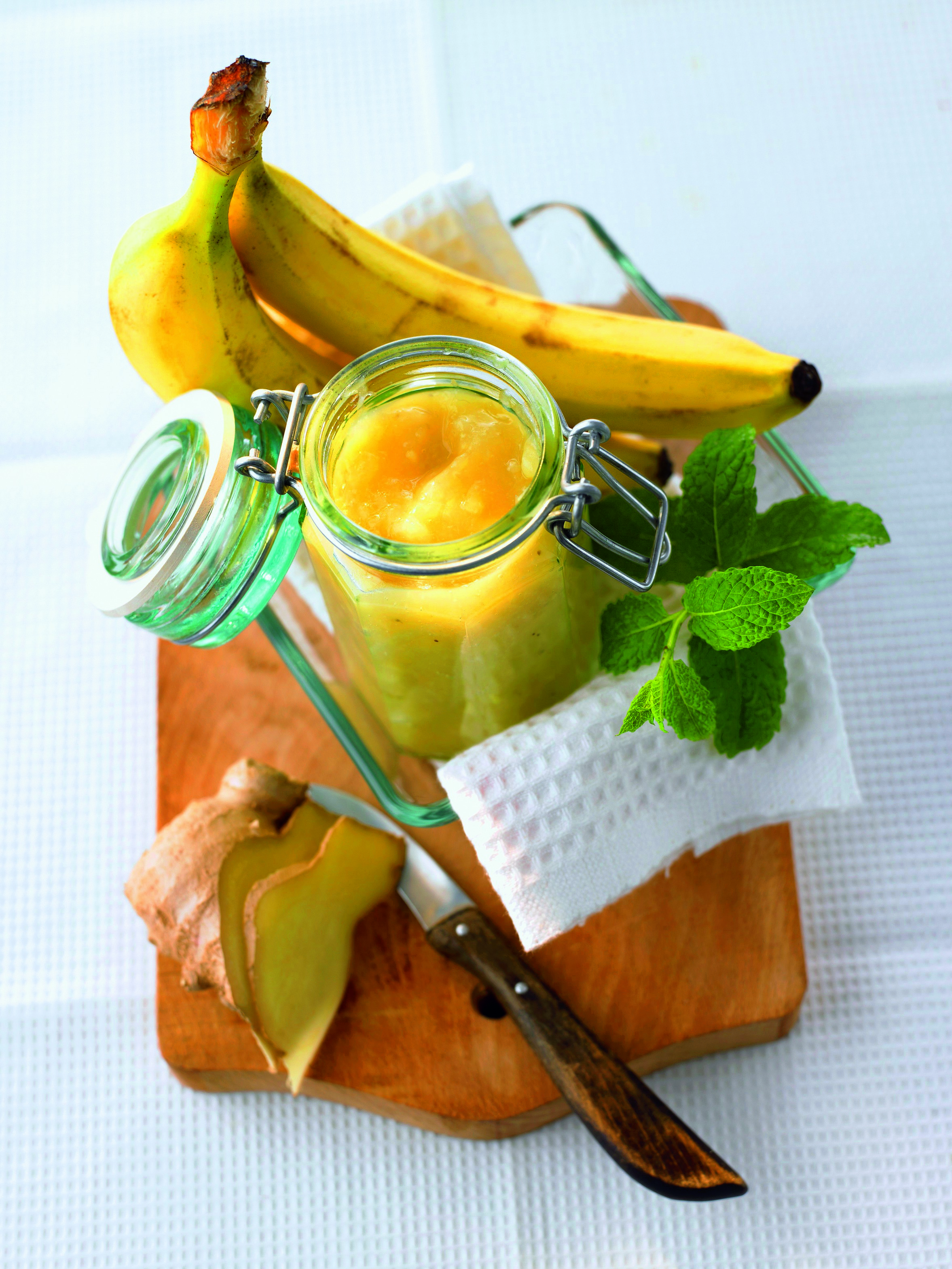 banana-and-ginger-jam-with-ingredients-on-chopping-board.bin