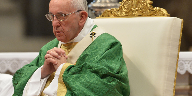 Pope Francis leads a mass for the opening of the synod on the family on October 4, 2015 at St Peter's basilica in Vatican. Pope Francis opened a gathering of bishops intended to review Catholic teaching on the family against a backdrop of controversy over homosexuality. The church's second synod on the family opened in a tense atmosphere the day after a senior priest announced he was gay and accused the Vatican of 