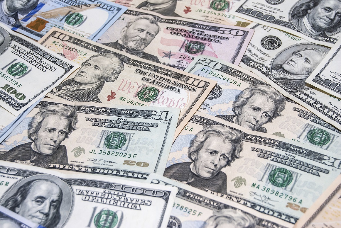 set of american dollar bills as background