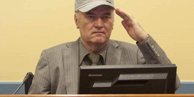 THE HAGUE, NETHERLANDS - JUNE 3: (NETHERLANDS OUT)  (EDIOTRS NOTE: ALERNATE CROP) Ratko Mladic makes his first appearance at the International Criminal Tribunal on June 3, 2011 in The Hague, Netherlands. Ex-Bosnian Serb army leader Ratko Mladic will make his first appearance at The Hague war crimes tribunal after being declared fit to stand trial. Mladic was arrested a week ago after going into hiding for the past 16 years and is charged with atrocities committed during the Bosnian war. (Photo Serge Ligtenberg/Getty Images )