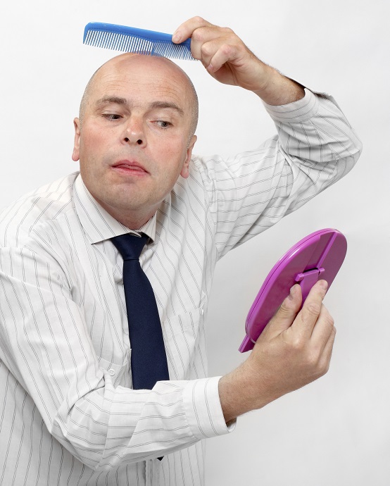 Hairless businessman with mirror - forever beautiful. ( Narcissus concept )