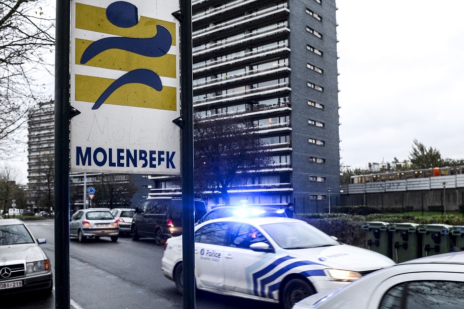 A picture taken on November 16, 2015 shows the Molenbeek road sign in the Molenbeek-Saint-Jean district in Brussels. Brussels' Molenbeek area, long infamous in Belgium's capital city for its crime and unemployment, has emerged once again as a European hotbed of Islamist extremism where residents say they live in fear. Residents of the largely Muslim area said they were caught in the middle of a war as police blocked off a main street on November 16 in the latest of many raids since it emerged at least one of the Paris attackers had lived there. AFP PHOTO / BELGA / DIRK WAEM=BELGIUM OUT=