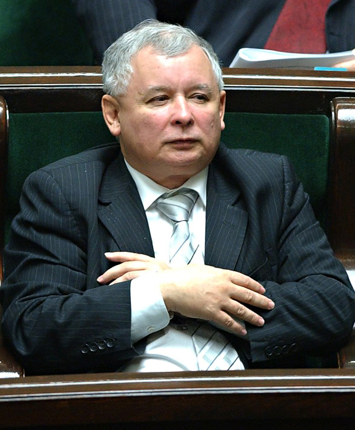 FILE - The Nov. 23, 2007 file photo shows former Prime Minister Jaroslaw Kaczynski listening as his successor Donald Tusk, not seen, presents the new cabinet's plans in the parliament,  in Warsaw, Poland. Polish opposition party leader Jaroslaw Kaczynski said Monday, April 26, 2010 he will run in summer elections to replace his twin brother, the incumbent president who was killed in a plane crash. Law and Justice party leader Jaroslaw Kaczynski, 60, said he will run to continue the mission of his brother and others killed in the crash. 