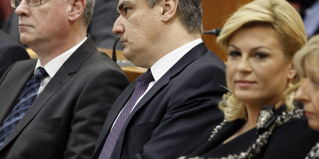 Zagreb, 031215.Hrvatski sabor. Prva konstituirajuca sjednica u 8. sazivu Hrvatskog Sabora na kojem su pozvani zastupnici izabrani na izborima u studenom.Na fotografiji: Branko Hrvatin, Zoran Milanovic, Kolinda Grabar Kitarovic.Foto: Dragan Matic / CROPIX