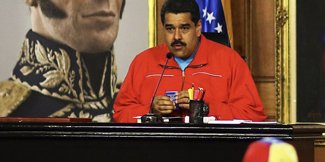 Handout picture released by the Venezuelan presidency press office showing Venezuelan President Nicolas Maduro during a press conference after knowing the first result in the legislative election, in Caracas on December 7, 2015. Venezuela's opposition won control of the state legislature, electoral authorities said Monday, in a blow to the oil-rich country's socialist government that has held the congress for 16 years. Maduro called for the opposition to 