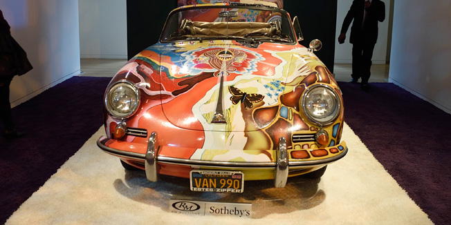 Janis Joplins History of the Universe 1964 Porsche 356 SC Cabriolet is exhibited at Sotheby's December 9, 2015 in New York. The car is to be auctioned December 10, 2015 during the Driven by Disruption auction at Sotheby's in New York. AFP PHOTO/DON EMMERT