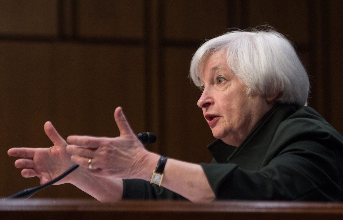 (FILES) This December 3, 2015 file photo shows Chair of the US Federal Reserve Janet Yellen as she testifies before a Joint Economic Committee hearing on Capitol Hill in Washington, DC. The US Federal Reserve is widely expected to finally push interest rates up after seven years at the zero level when it opens a two-day policy meeting on December 15, 2015.The break, well-flagged by Fed officials including Chair Janet Yellen, would signify leaving behind the extraordinary crisis stance in monetary policy that aimed to restore the US economy's strength after the financial crisis and deep recession of 2008-2009.AFP PHOTO/NICHOLAS KAMM 