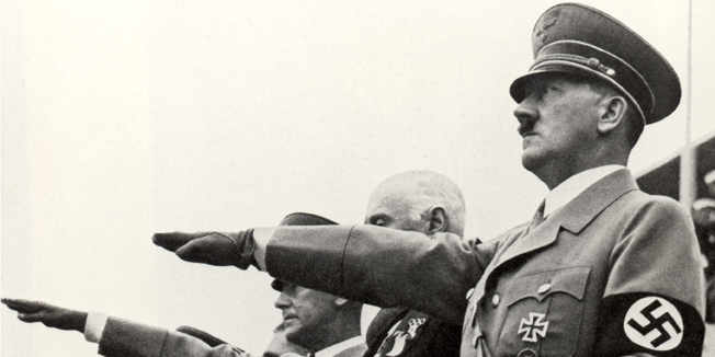 BERLIN - AUGUST 1:  Adolf Hitler and his staff salute the teams during the opening ceremonies of the XI Olympic Games on August 1, 936 in Berlin, Germany.   (Photo by Getty Images)