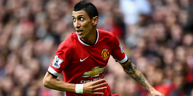 MANCHESTER, ENGLAND - SEPTEMBER 27:  Angel di Maria of Manchester United runs with the ball during the Barclays Premier League match between Manchester United and West Ham United at Old Trafford on September 27, 2014 in Manchester, England.  (Photo by Laurence Griffiths/Getty Images)