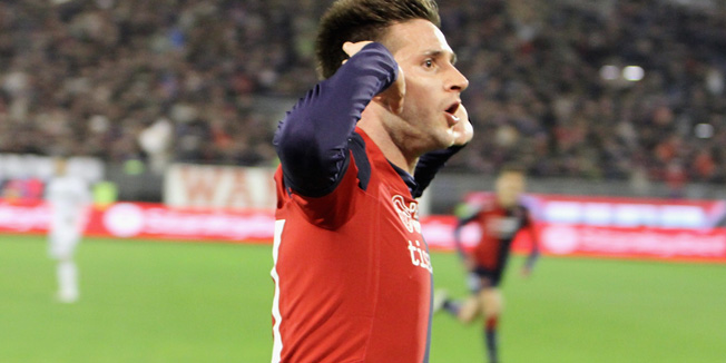 CAGLIARI, ITALY - JANUARY 24: Duje Cop of Cagliari celebrates a goal during the Serie A match between Cagliari Calcio and US Sassuolo Calcio at Stadio Sant'Elia on January 24, 2015 in Cagliari, Italy.  (Photo by Enrico Locci/Getty Images)