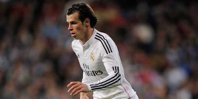 MADRID, SPAIN - DECEMBER 06:  Gareth Bale of Real Madrid in action during the La Liga match between Real Madrid CF and Celta Vigo at Estadio Santiago Bernabeu on December 6, 2014 in Madrid, Spain.  (Photo by Denis Doyle/Getty Images)